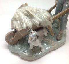 Lladro Boy with Wheelbarrow and Dog
