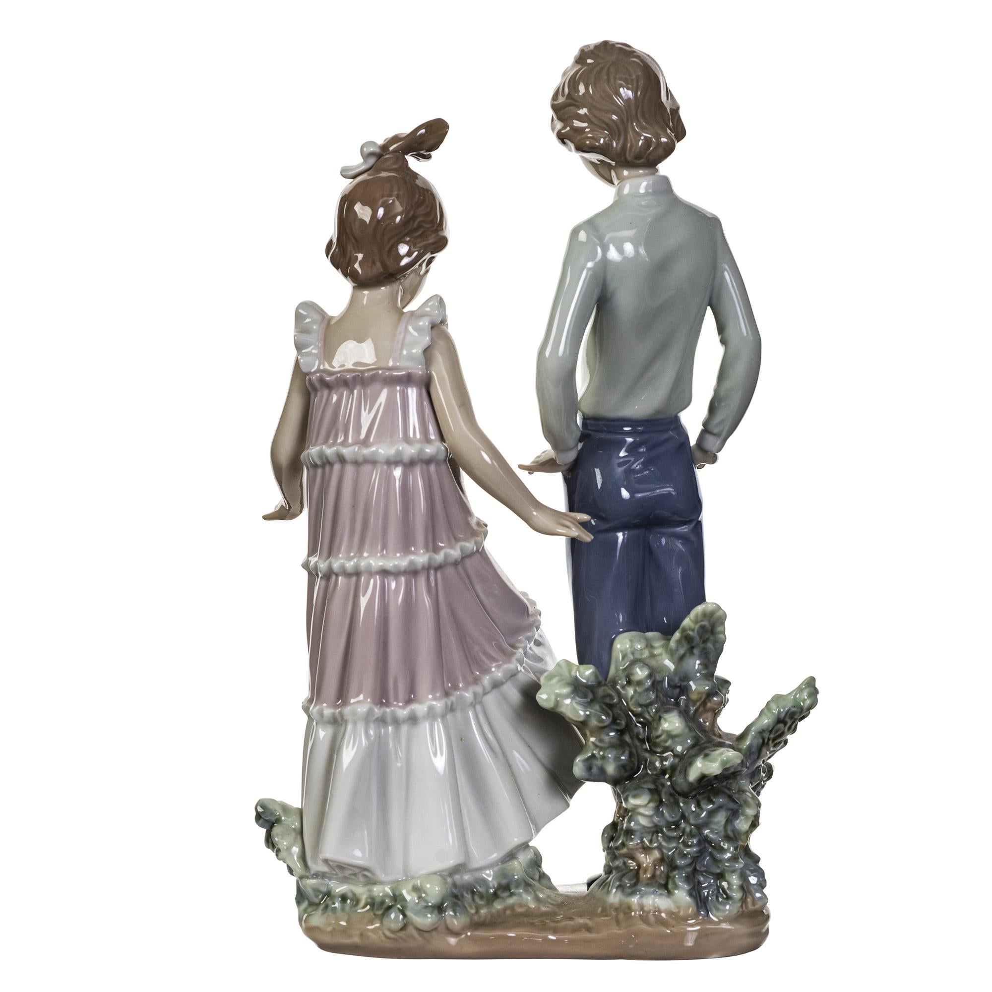 lladro figurines boy and girl