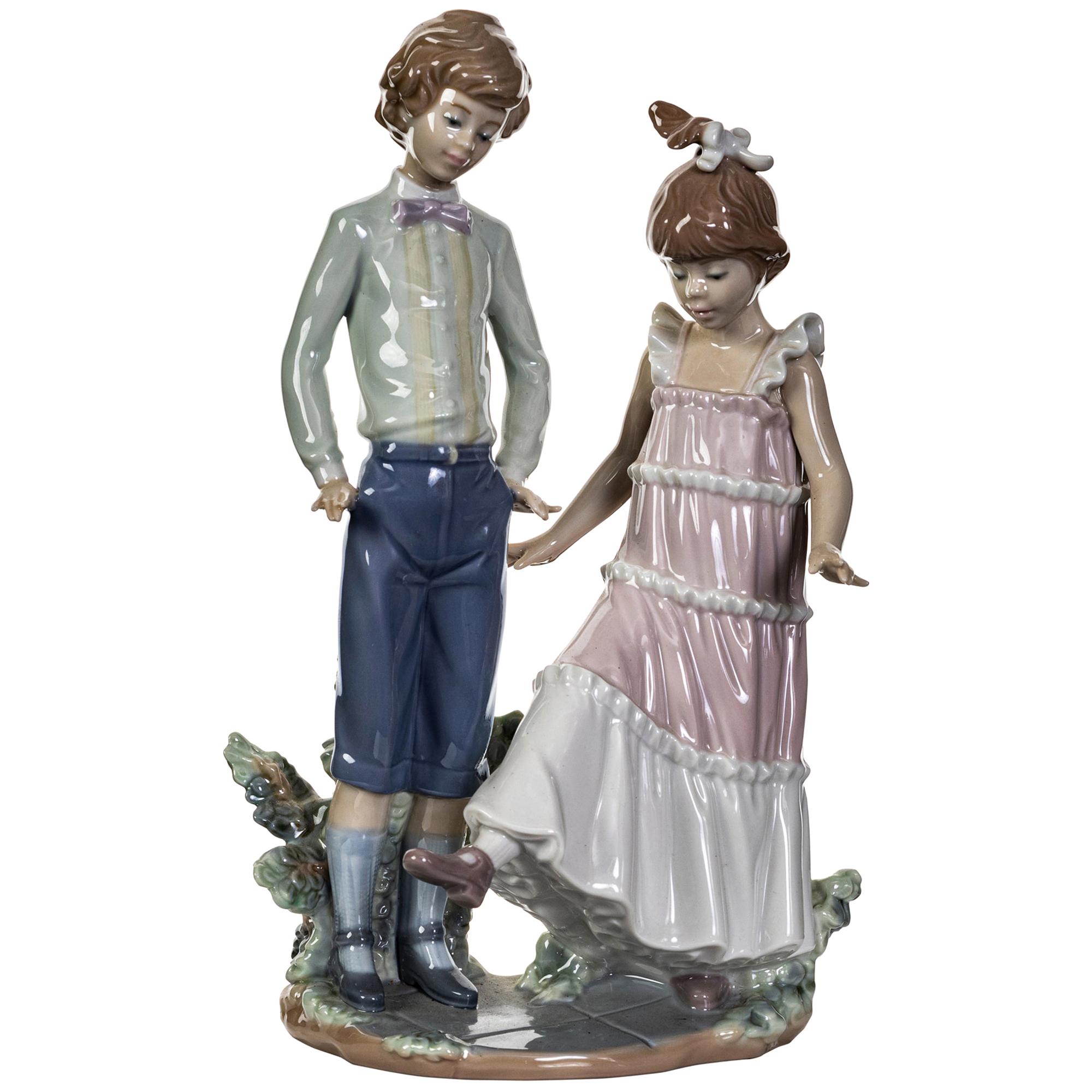 Lladró, Established 1953 "First Dance" Figures of a Boy and Girl For Sale