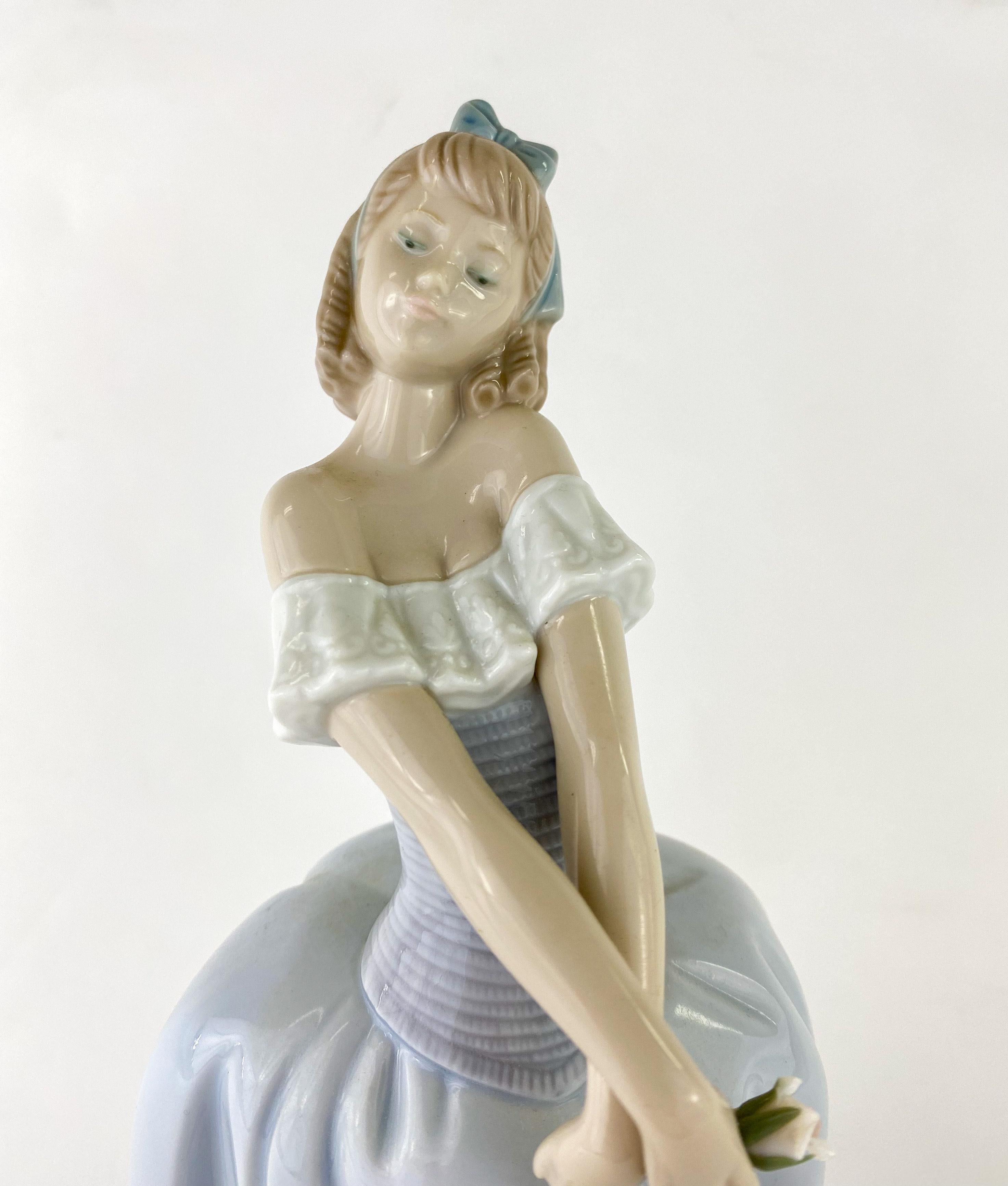 lladro girl with flowers