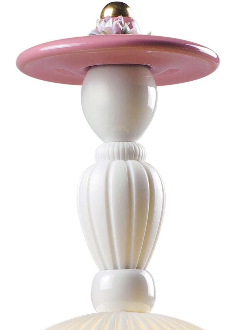 Table lamp with a handmade design in brightly colored porcelain and floral decorations with a light. The Mademoiselle collection is inspired by Lladró's romantic ladies, one of his most traditional motifs, to create contemporary and daring designs,