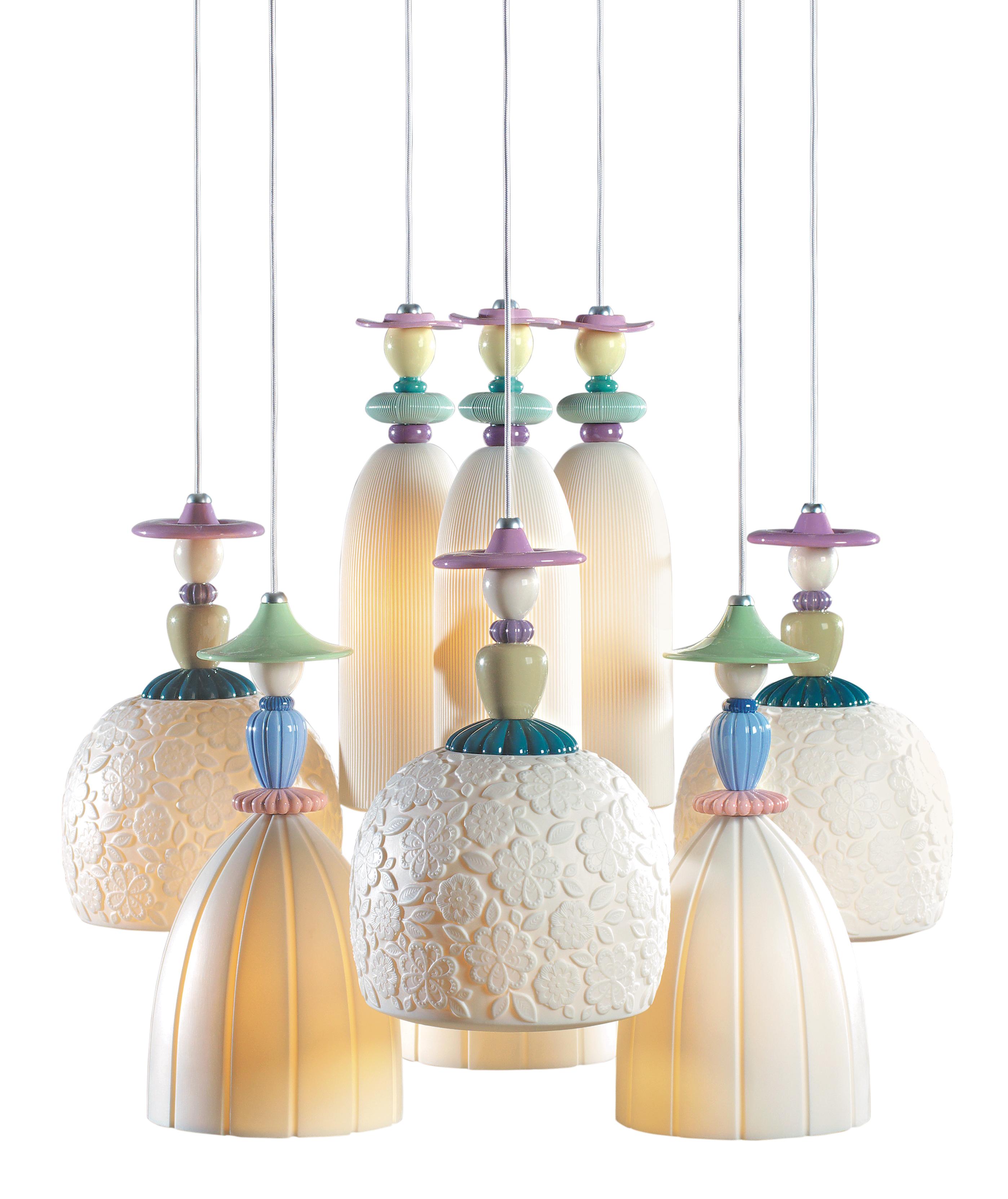 Handmade hanging ceiling lamp in brightly colored porcelain and floral decorations with nine engraved translucent white porcelain tulips. The Mademoiselle collection is inspired by Lladró's romantic ladies, one of his most traditional motifs, to