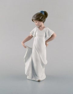 Lladro, Nao and Rex, Spain, Four Porcelain Figurines of Young Girls, 1970s-1980s