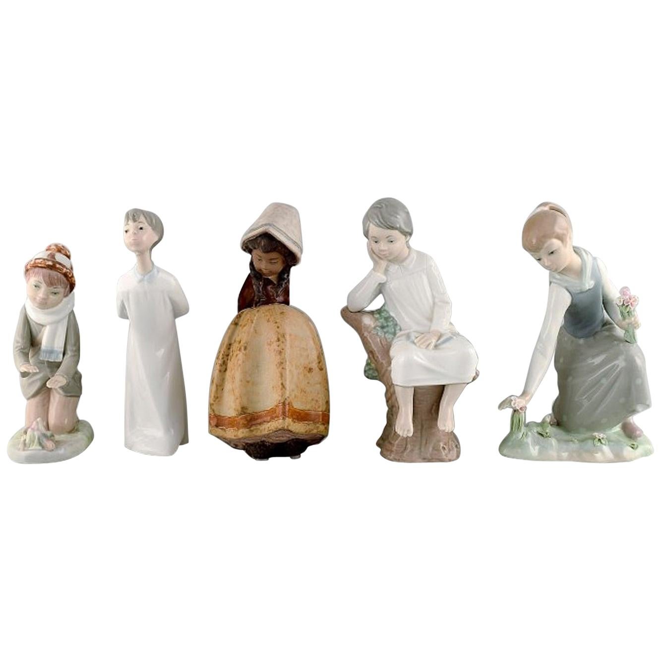 Lladro, Nao and Zaphir, Spain, Five Porcelain Figurines of Children, 1980s-1990s