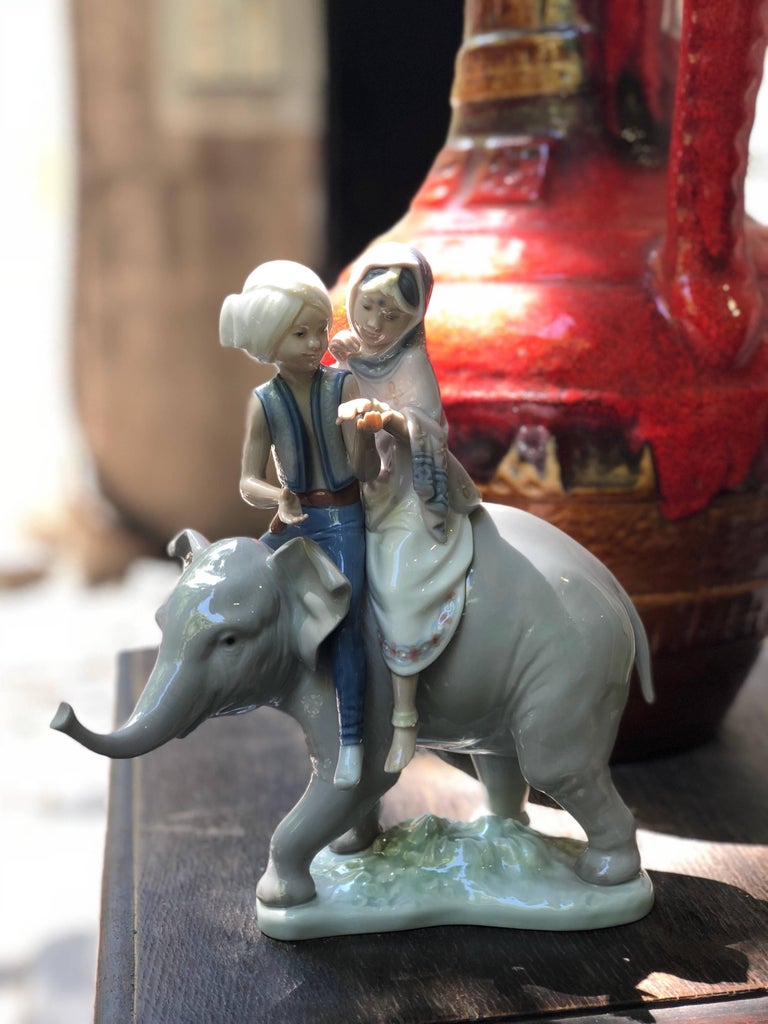 lladro elephant with riders