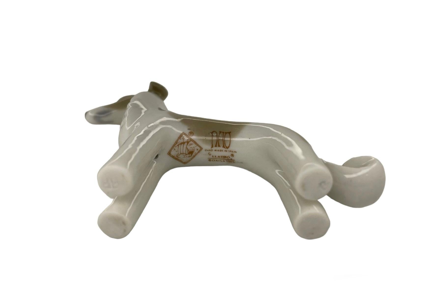 Molded Lladro Porcelain Mini Figurine Of A Dog For Sale