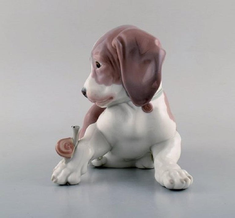 lladro dog and snail