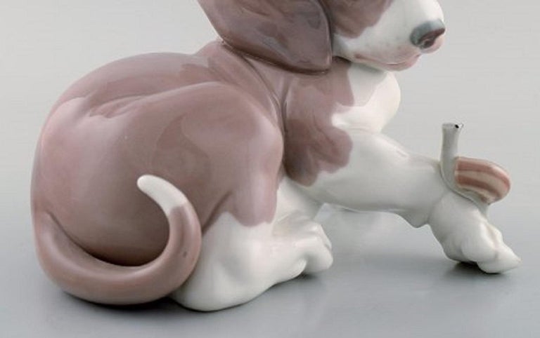 lladro dog and snail