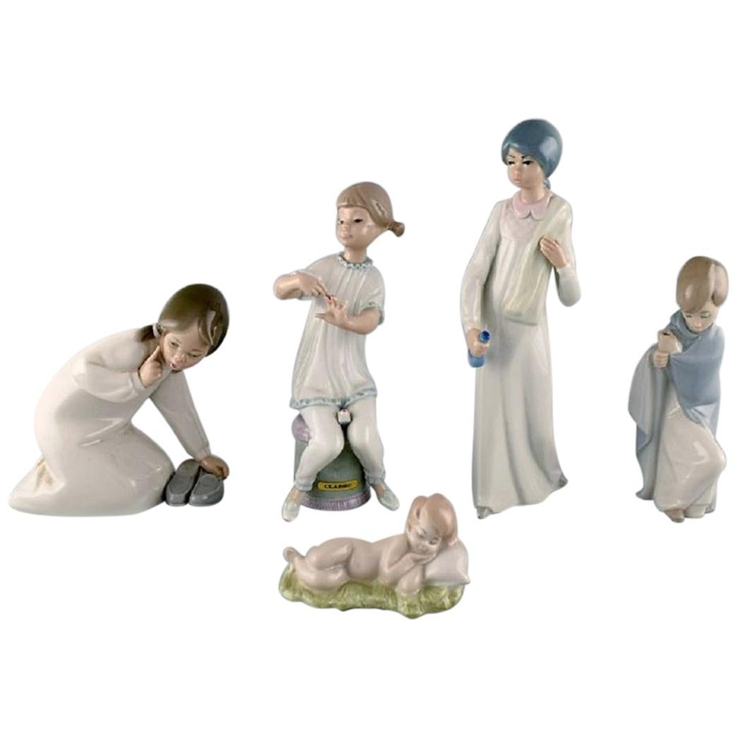 Lladro, Spain, Five Porcelain Figurines of Children, 1970s-1980s