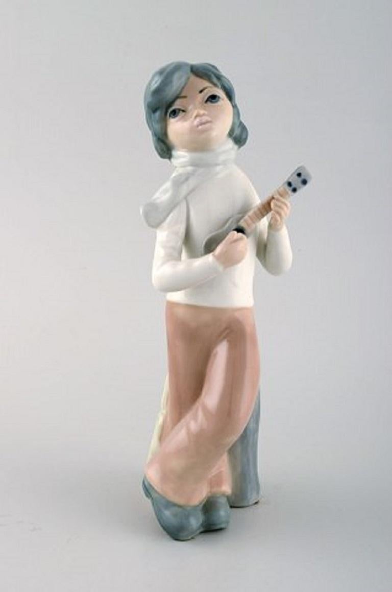 Late 20th Century Lladro, Spain, Four Porcelain Figurines, Children with Instruments, 1980s For Sale
