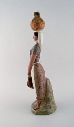 Lladro, Spain, Large Figure in Glazed Ceramics, Woman Carrying Water