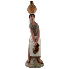 Lladro, Spain, Large Figure in Glazed Ceramics, Woman Carrying Water