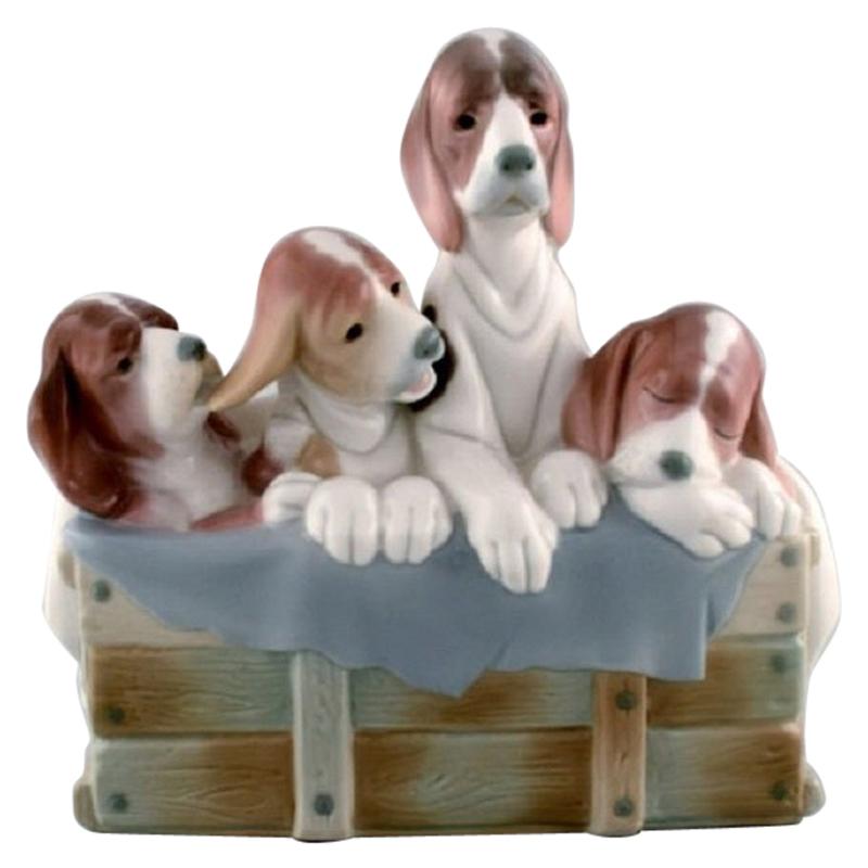 Lladro, Spain, Large Figure in Glazed Porcelain, Four Puppies in a Basket, 1980s