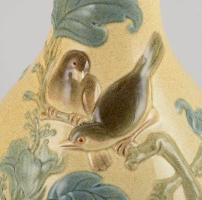 Spanish Lladro, Spain, large porcelain vase with flowers and birds in relief. 
