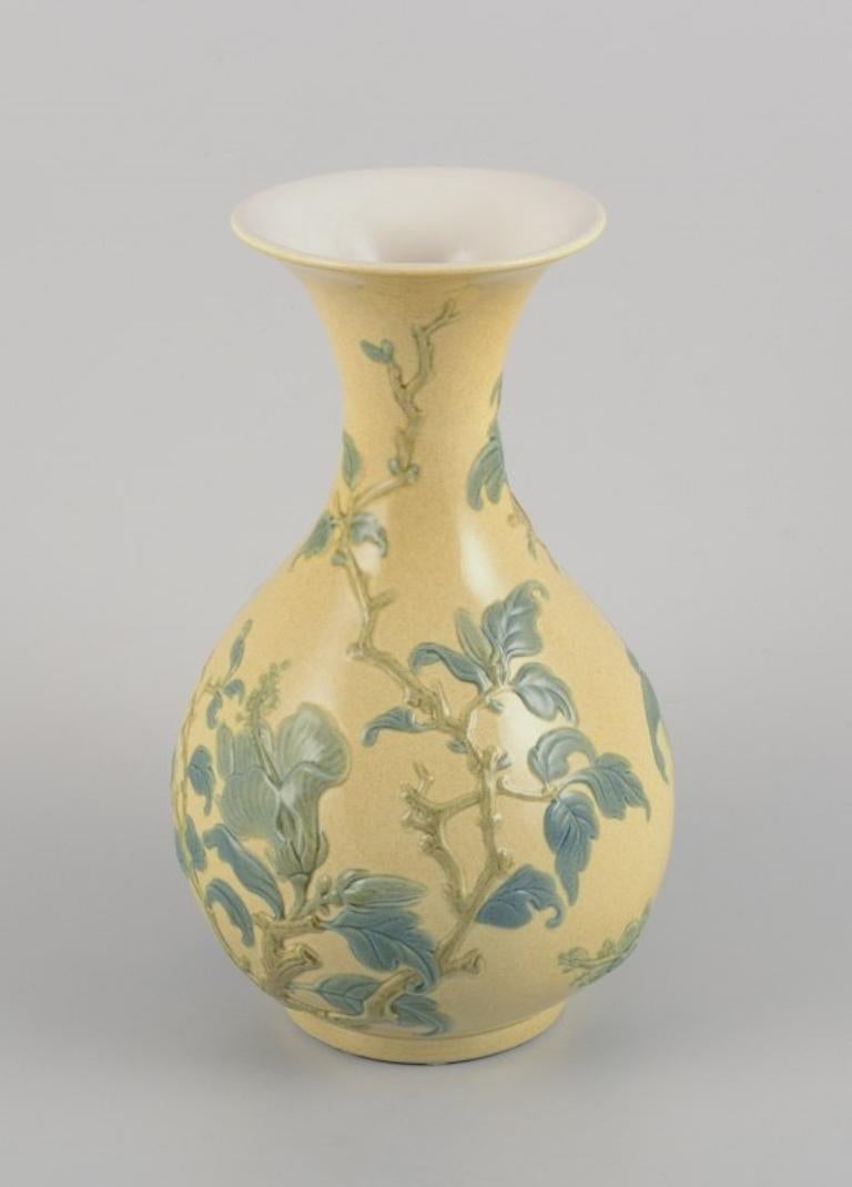 Lladro, Spain, large porcelain vase with flowers and birds in relief.  In Excellent Condition In Copenhagen, DK