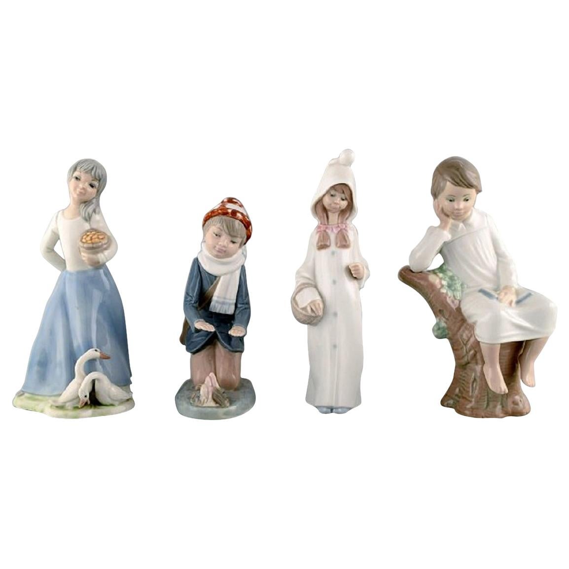 Lladro, Tengra and Zaphir, Spain, Four Porcelain Figurines of Children For Sale