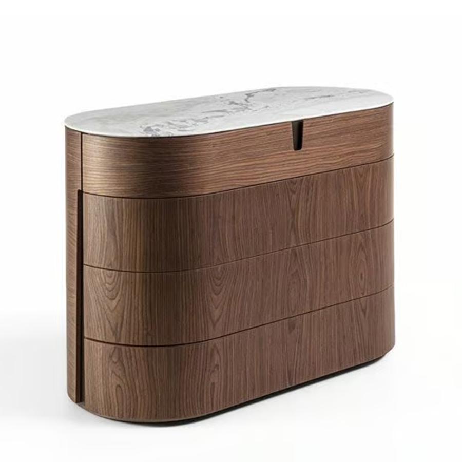 Cassettiera Lleno Marmo bianco con struttura in legno massiccio di noce e 
con base in metallo con finitura bronzata. Con 4 cassetti e un cassetto superiore
diviso in 3 magazzini. Piano in marmo bianco Whiting con finitura Dover.
Disponibile su