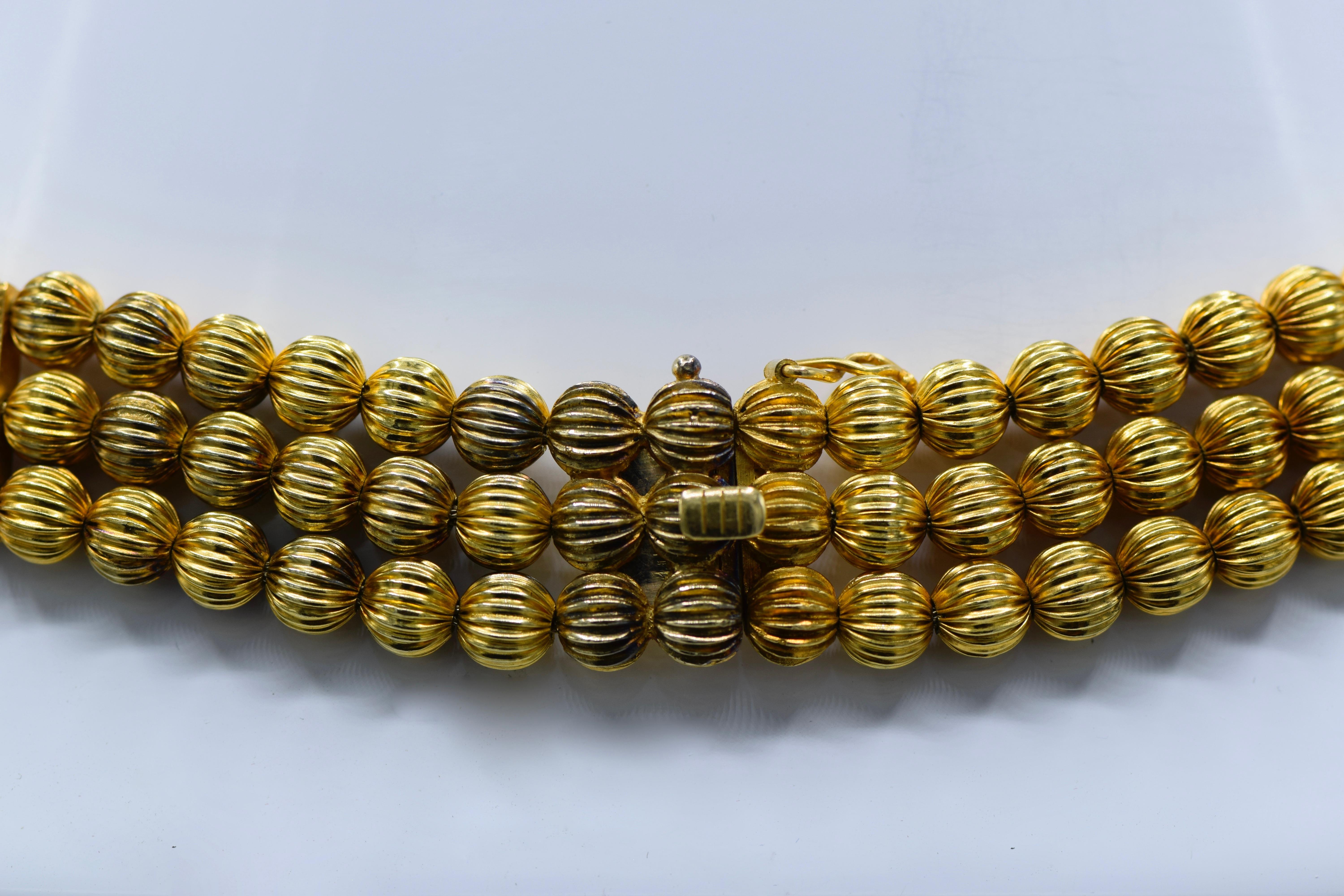 lles Lalaounis, Triple Strand Gold Bead Necklace In Excellent Condition In New York, NY