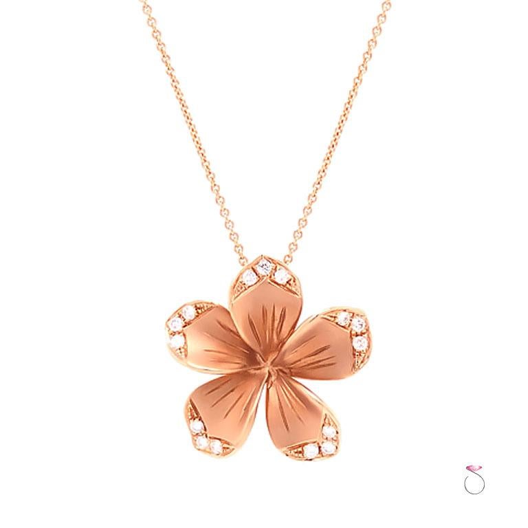 LLK diamond plumeria flower pendant with in 14k rose gold. This gorgeous plumeria flower pendant features 5 petals beautifully crafted in 14k rose gold. Each petal is set with 3 round brilliant diamonds on its end. A total of 15 round brilliant cut