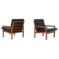 lllum Wikkelso Capella lounge chairs in teak Niels Eilersen Denmark 1960