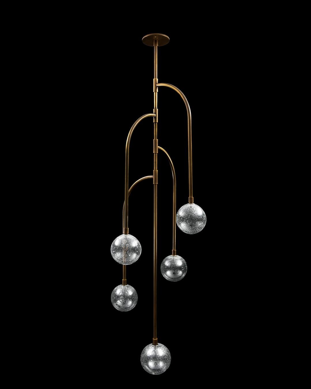 JAVIER ROBLES 1ST EDITION

Inspired by the Latin American legend of the weeping mother, the Llorona lighting collection recalls the form of the weeping willow tree.

Elegantly suspended from the ceiling, the simple curves of the pendant maintain a