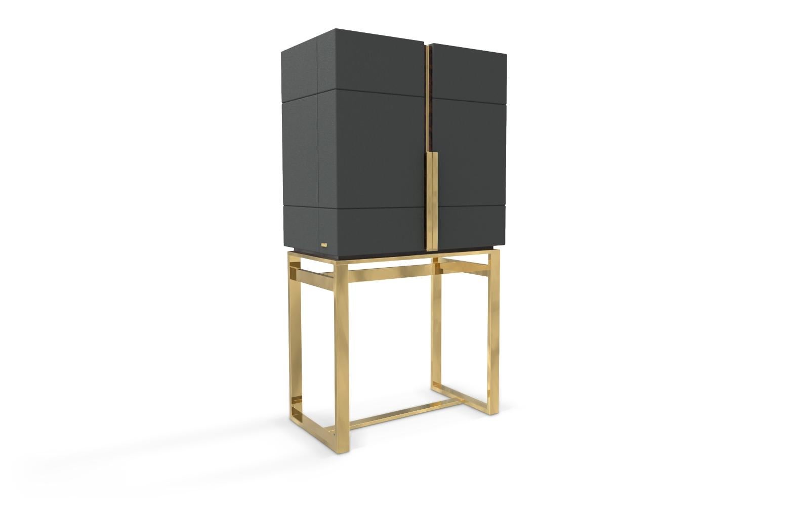 With geometric lines and elegant shape, the Lloyd bar cabinet provides not only a Classic storage option but an accent piece that will become the focal point of your interiors. Made with quality materials such as gold-plated brass, this piece will
