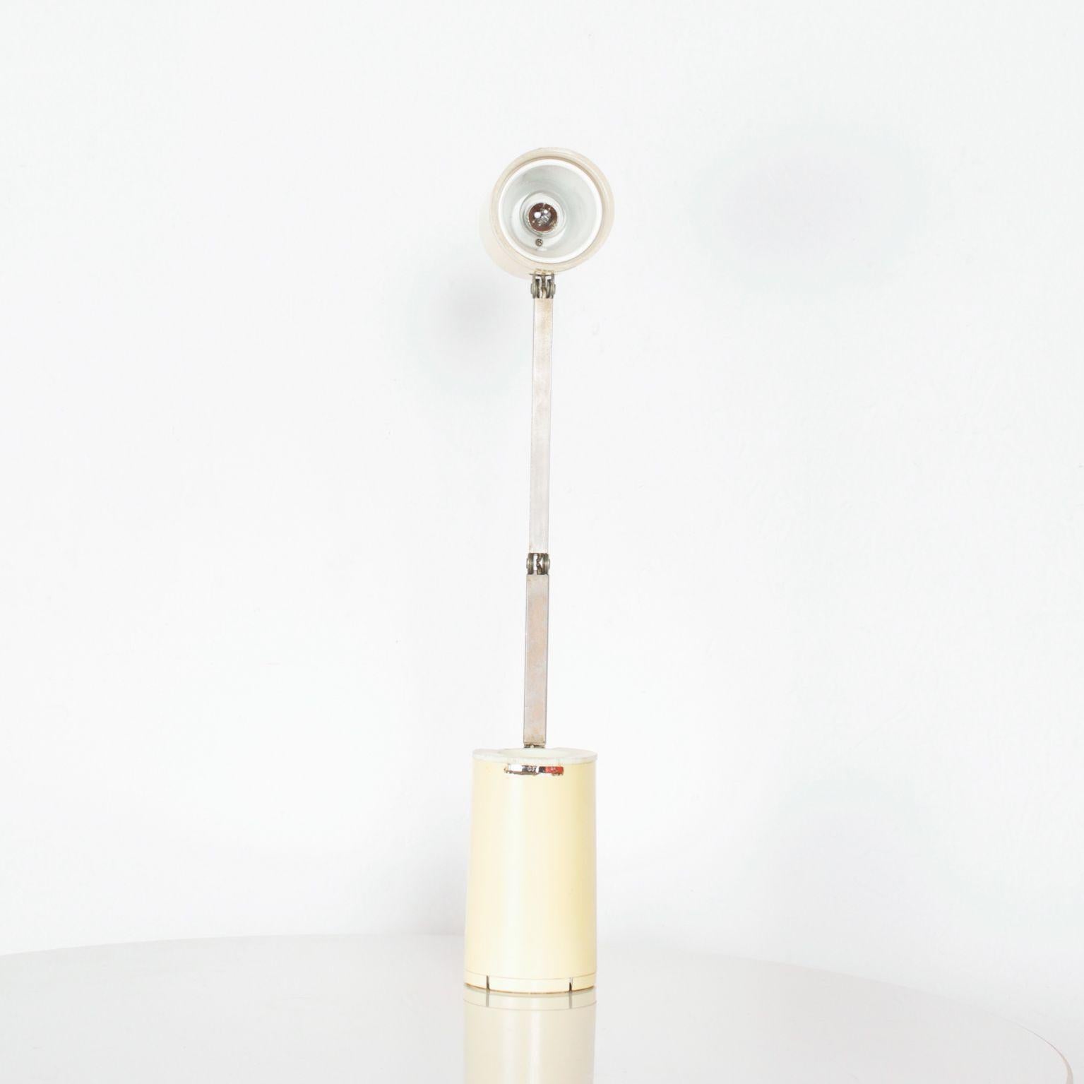 For your pleasure: Mid-Century Modern vintage table desk task lamp by LLOYD 1960s from Japan

A vintage Lloyd compact adjustable desk lamp high intensity lamp, Compact -it can fold together as well as adjust the light in any direction