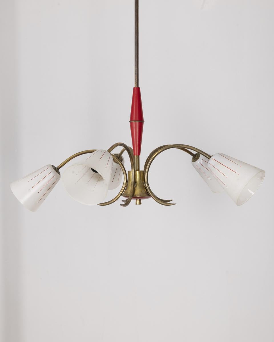 Six-light chandelier with glass shades, gilt brass and red metal frame, Italian design, 1960s.

CONDITION: In good, working condition, may show signs of wear given by time.

DIMENSIONS: Height 82 cm; Diameter 60 cm

MATERIALS: Brass, Metal and