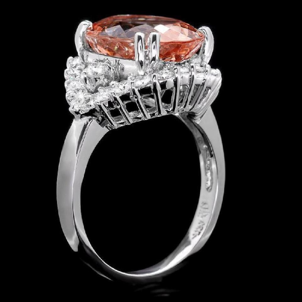 7.15 Carats Exquisite Natural Morganite and Diamond 14K Solid White Gold Ring

Total Natural Oval Shaped Morganite Weights: Approx. 6.20 Carats

Morganite Measures: Approx. 14.00 x 11.00mm

Natural Round Diamonds Weight: Approx. 0.95 Carats (color