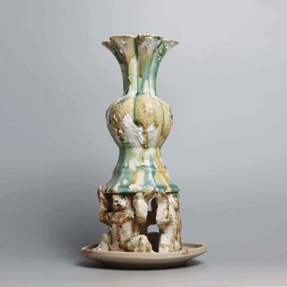 Lobed Ceramic Vessel is a hand-built stoneware work by Chinese artist Darren Dai, created through an intuitive process of pinching, pressing, and forming by hand. No molds are used, allowing every curve to carry the direct imprint of the artist’s