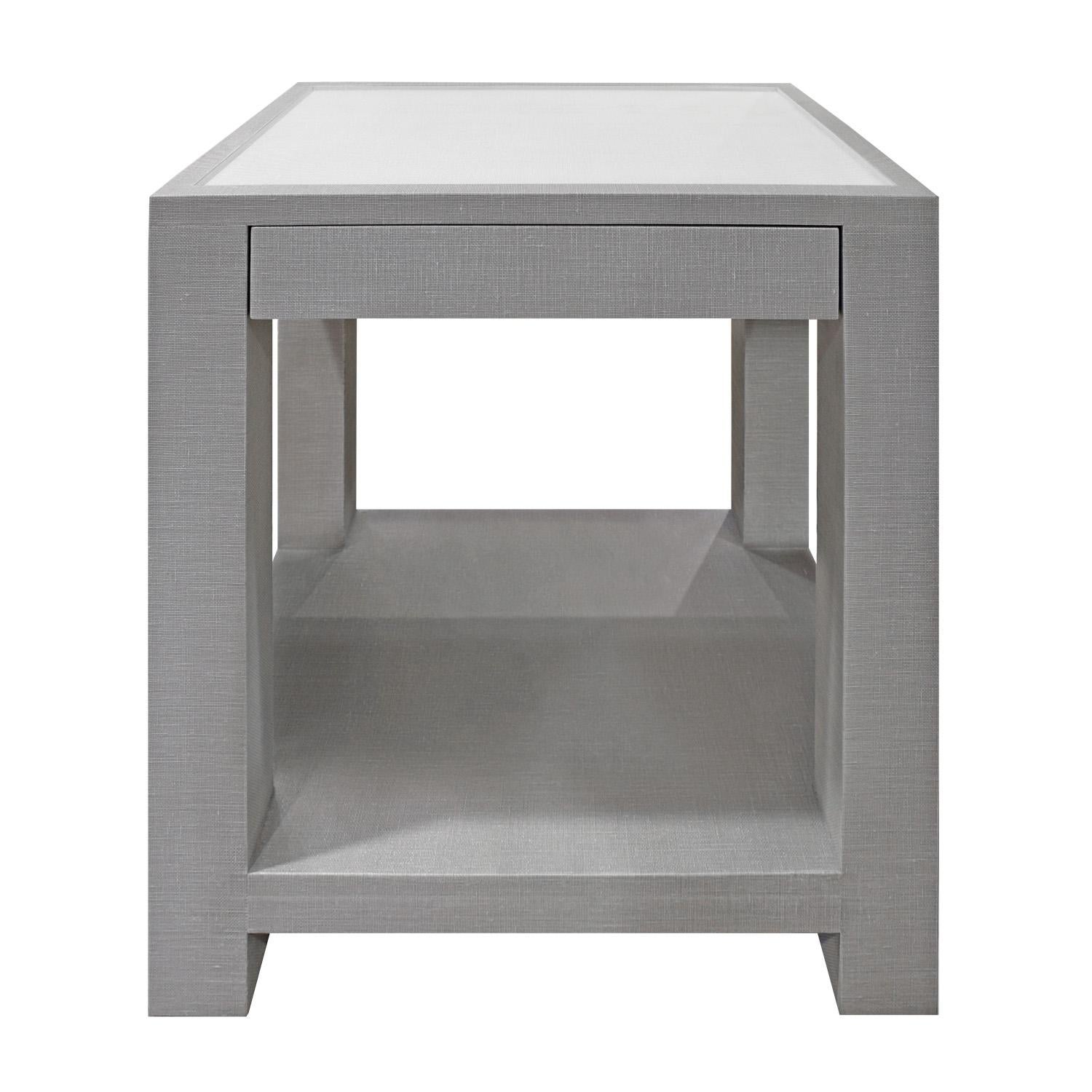 Pair of bedside/end tables model 1020 covered in 2-tone lacquered linen (as shown), each with a drawer and inset Starfire glass top, by Evan Lobel for Lobel Originals. These pieces are made to order. They can be made in any color and in any size and