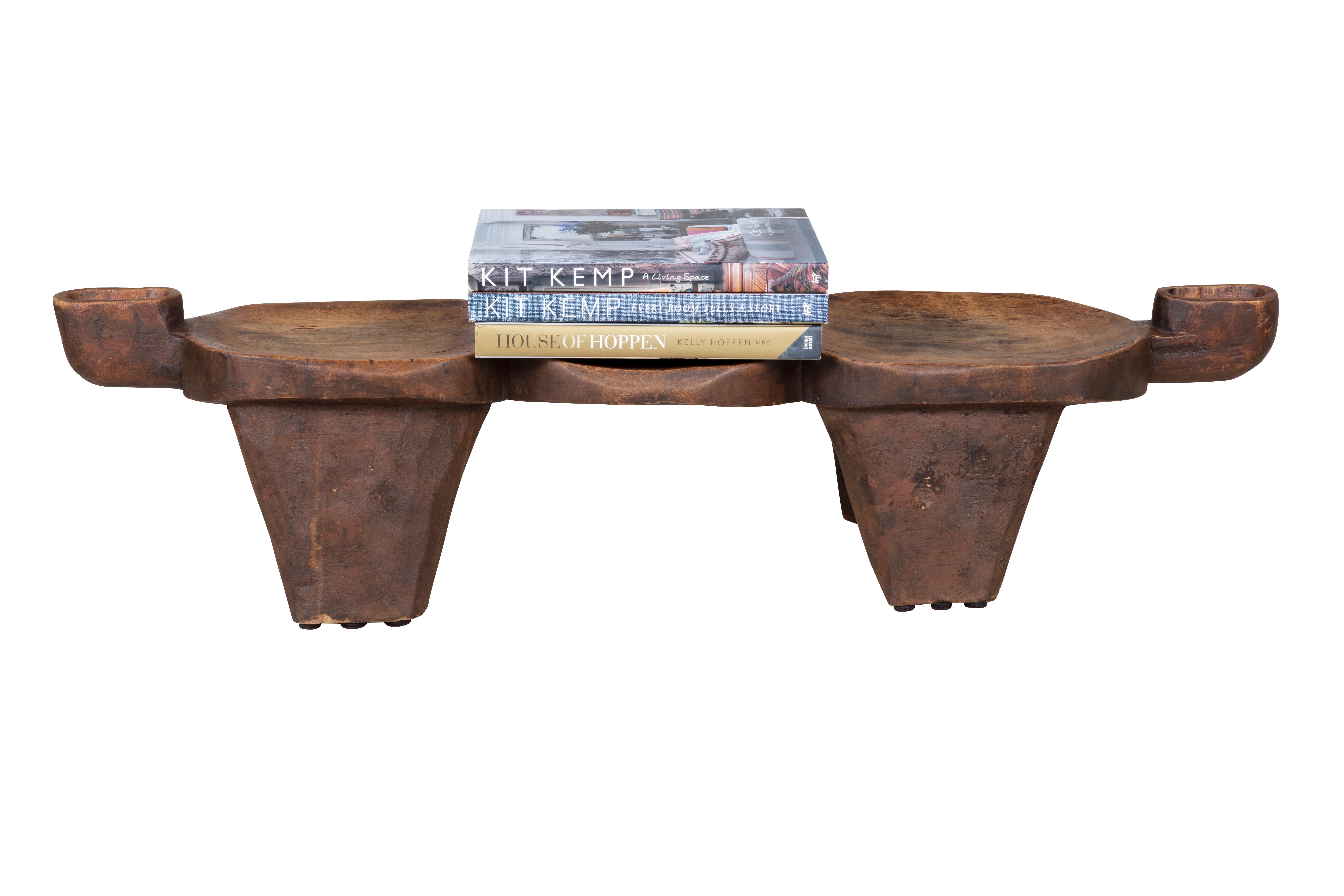 This uniquely shaped four-legged stool comes from the Lobi people of the Northern Ivory Coast and Ghana and the lower reaches of Burkina Faso. Spread across the boundaries of three countries the Lobi live in individual fort-like family compounds in