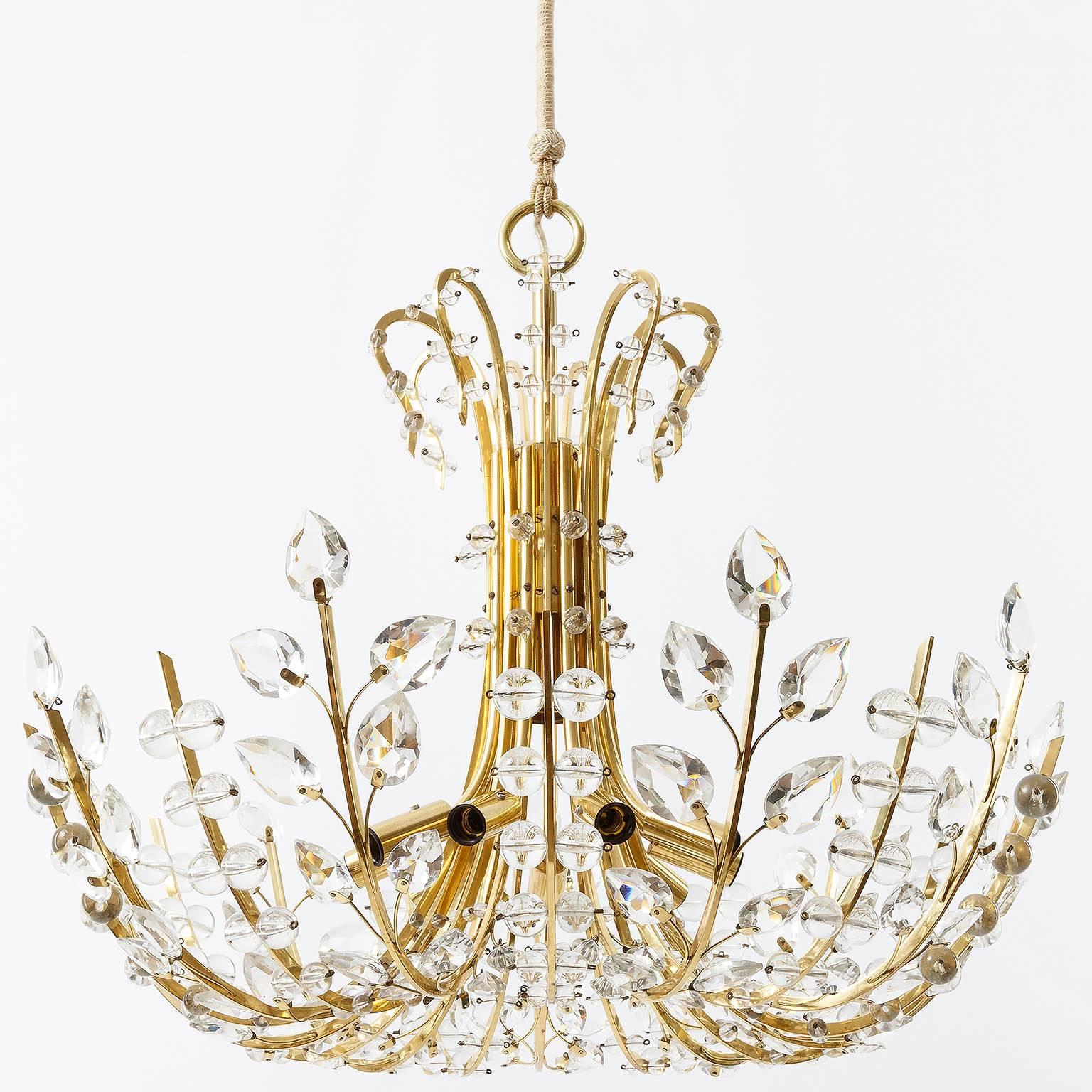 A fantastic and rare chandelier designed by Oswald Haerdtl in 1955 for J. & L. Lobmeyr, Vienna. 
The grace and loftiness of Haerdtls early works made him to one of the most important designers of his time. 
This light fixture was manufactured in