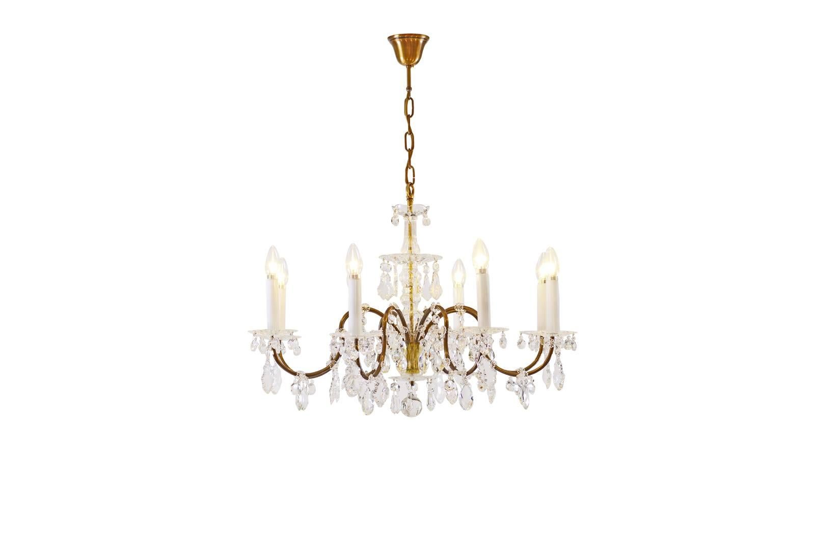 A beautiful and elegant Lobmeyr chandelier with rich hangings and a natural patina, the given height is just the chandelier with no suspension. Eight flames.