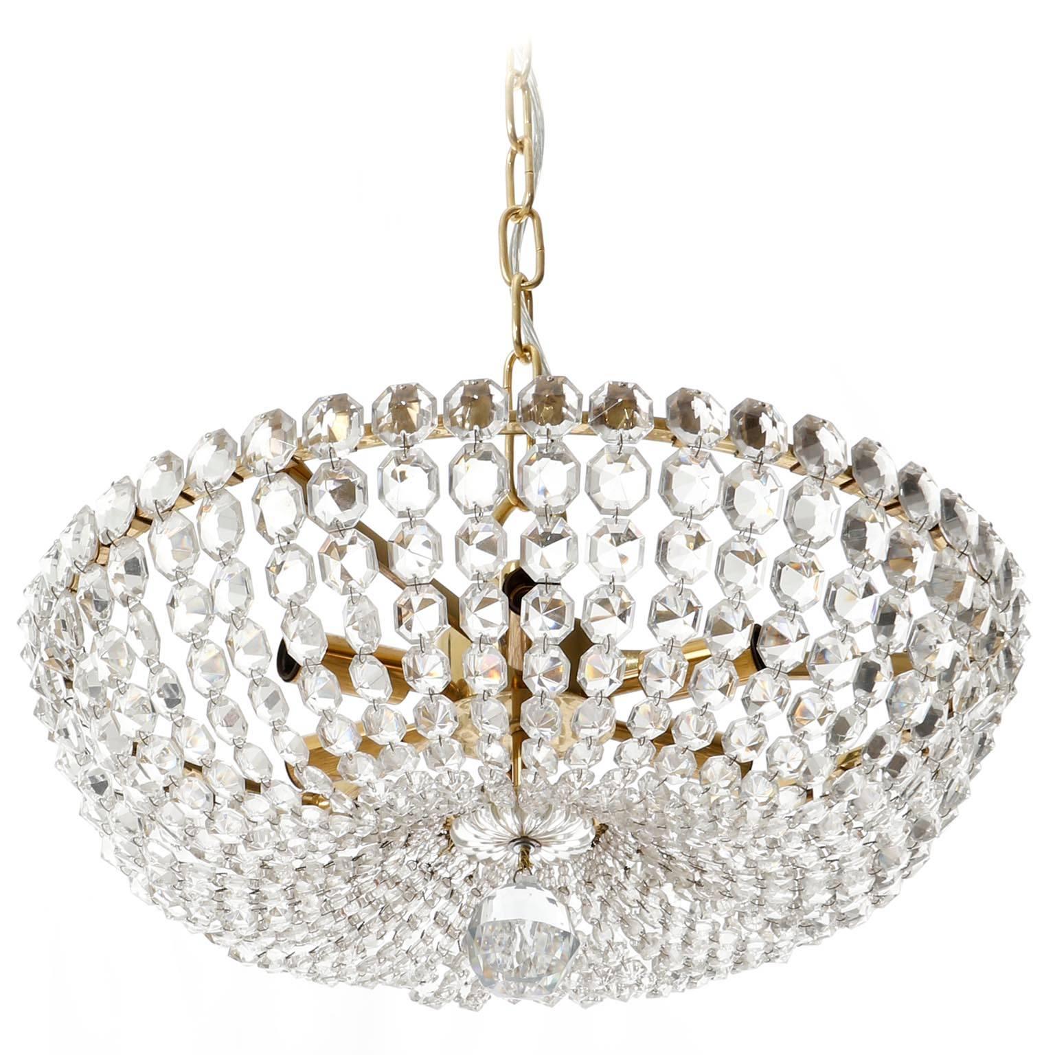 A beautiful basket light fixture model no. '6276 B' by J.L. Lobmeyr, Vienna, Austria, manufactured in Mid-Century, circa 1960 (late 1950s or early 1960s).
It is made of brass and hand cut diamond shaped crystal glass. Outstanding workmanship, a high