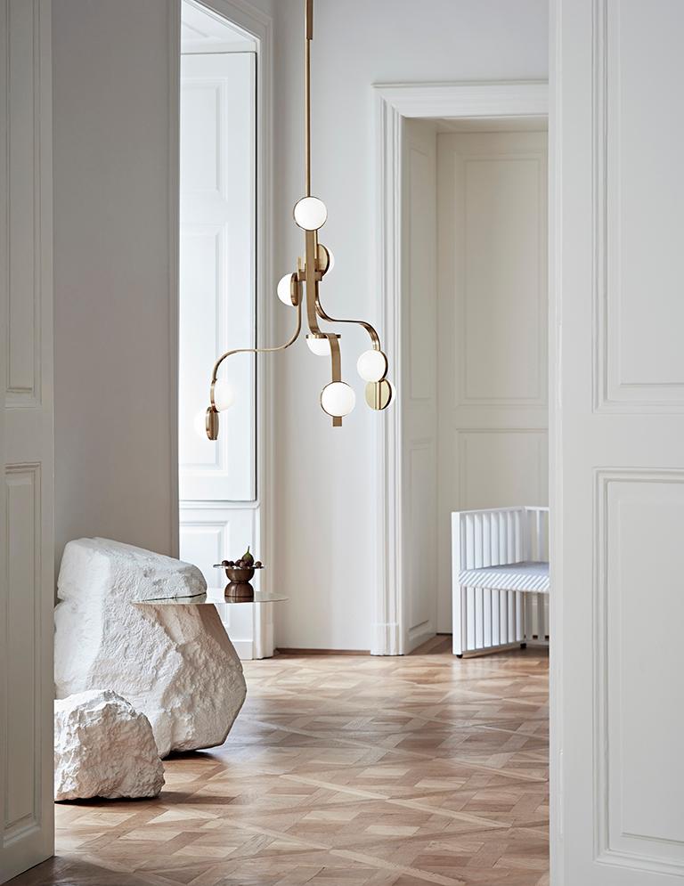 The Lobmeyr Script Chandelier is part of a lighting collection inspired by the Viennese Art Deco. The concept allows for many different applications, starting from a 3-arm chandelier it features table and floor lamps as a wall mounted lamp.

Made by