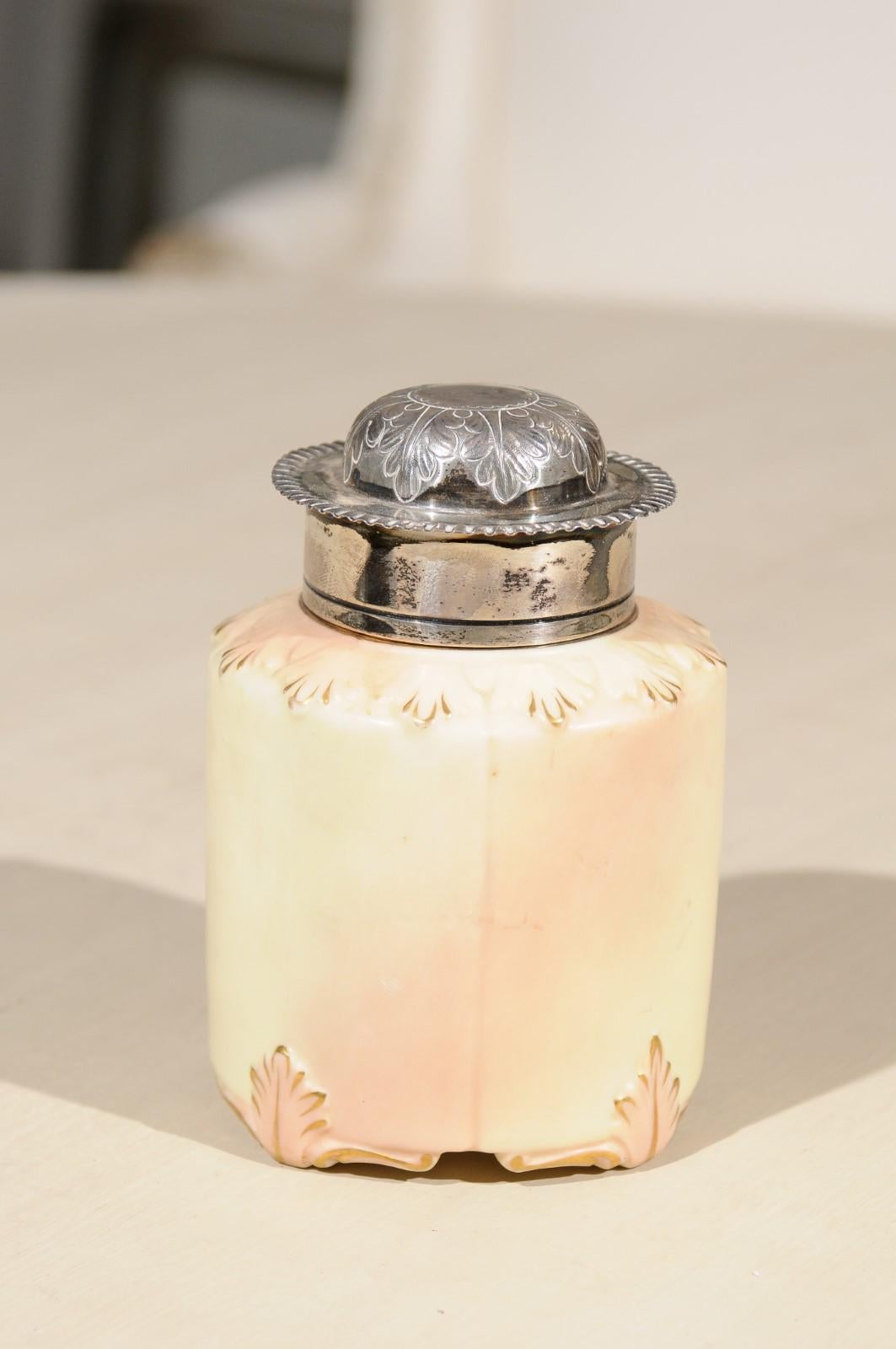 A turn of the century porcelain toiletry jar signed Locke & Co, Worcester England. Created by Edward Locke in the English Shrub Hill Worcester factory during the late 19th, early 20th century, this lovely toiletry jar features a porcelain body