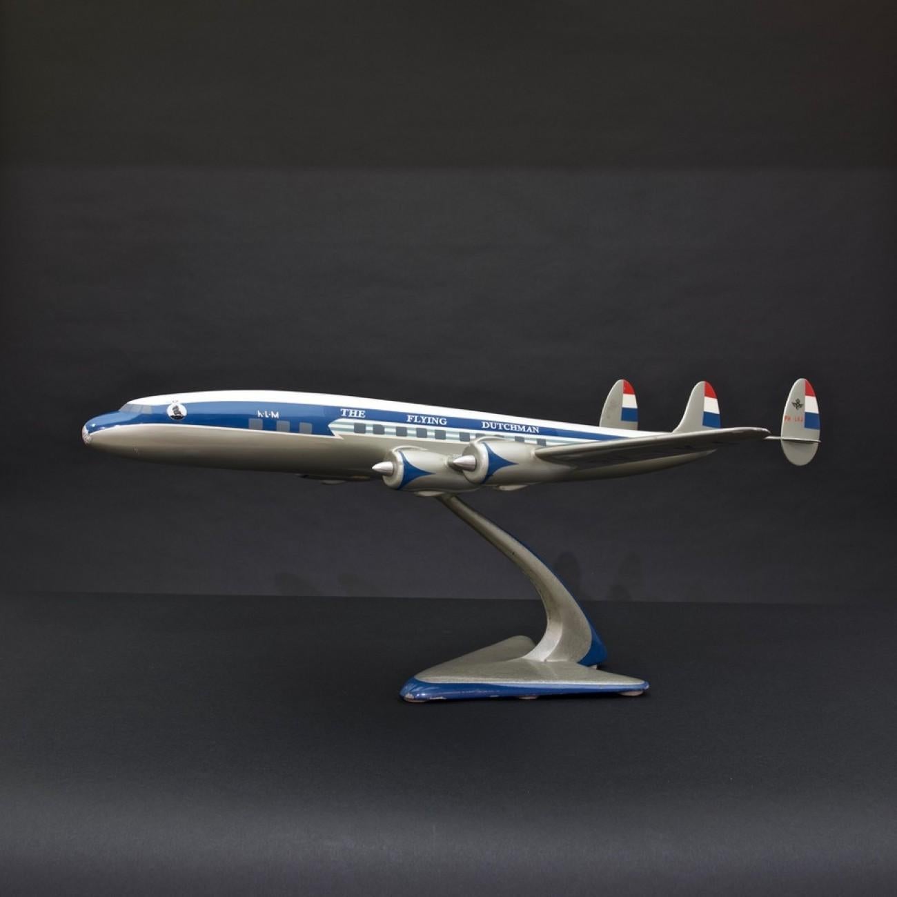 A fantastic cast aluminium model of a Super Constellation airplane on original stand in period KLM livery, circa 1953. By Walkers Westway Models who were active from 1942 - 1957 as bespoke model aircraft makers to the aircraft/airline industries,