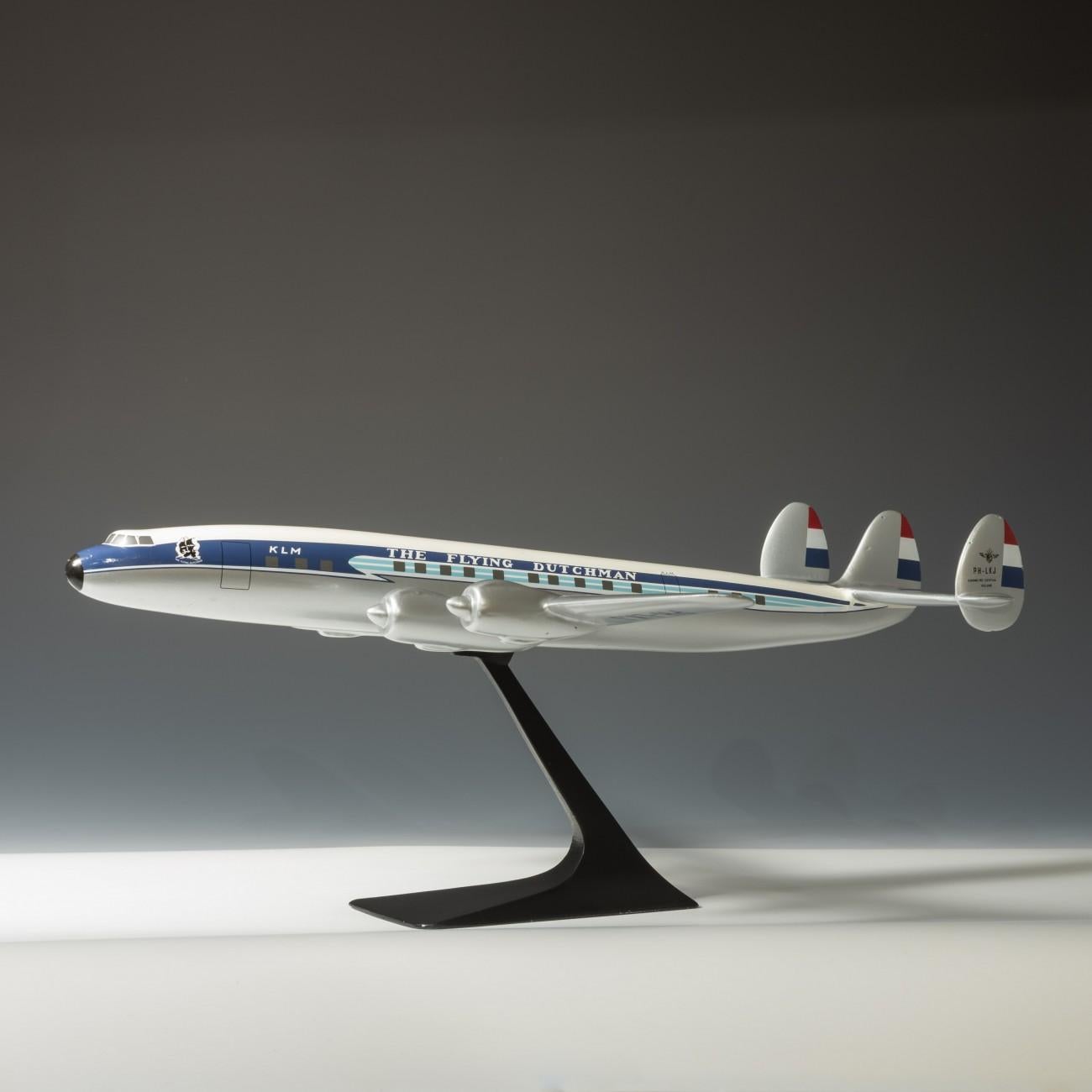 A fantastic painted cast aluminium model of a Super Constellation aircraft on original stand in period KLM livery, circa 1955. By a celebrated Dutch model maker, Maarten Matthijs Verkuyl, a specialist model maker that had contracts with aircraft