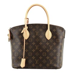 Louis Vuitton Black Leather Monogram Lockit Revaluation Bag rt. $3,800