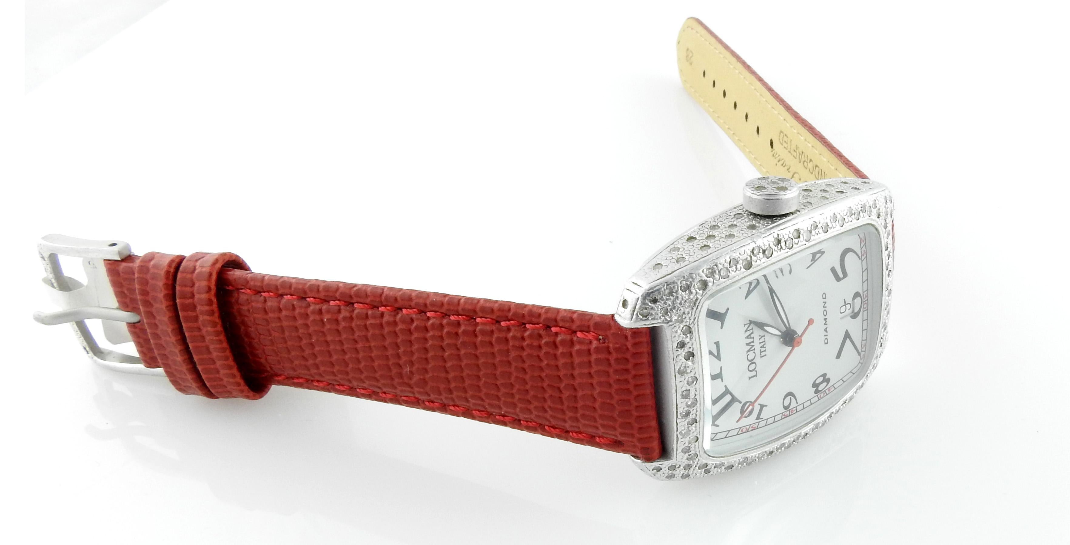 Locman Italy Ladies Diamond Watch

This Locman watch is set in aluminum with a pave diamond bezel and sides.

Quartz movement

32mm wide by 43mm long - case size

Ref. 488

New leather band - not locman - tang buckle is original to watcy

Very good