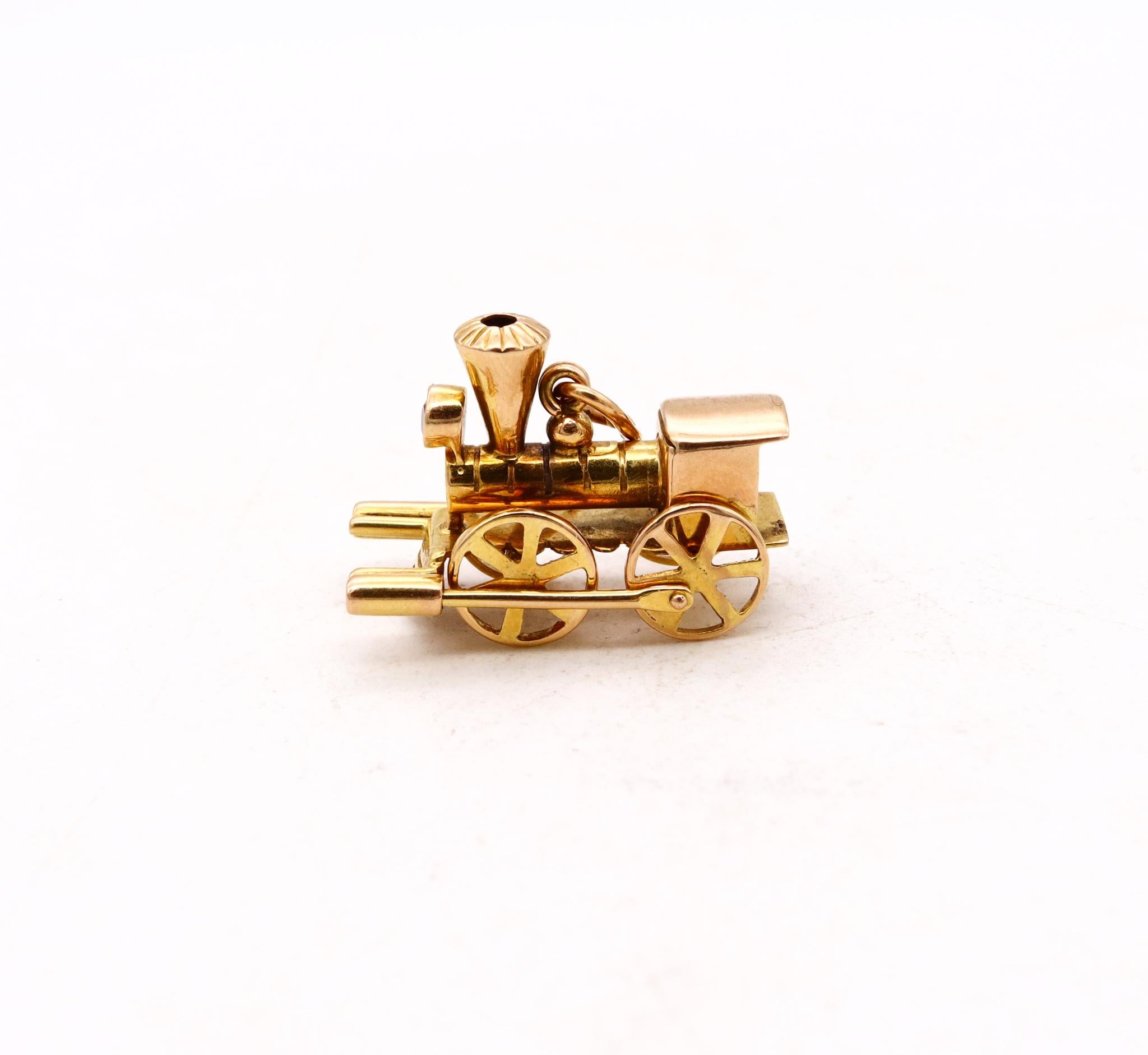 Brilliant Cut Locomotive Train Charm with Movable Mechanical Parts in Solid 18kt Gold and Ruby For Sale