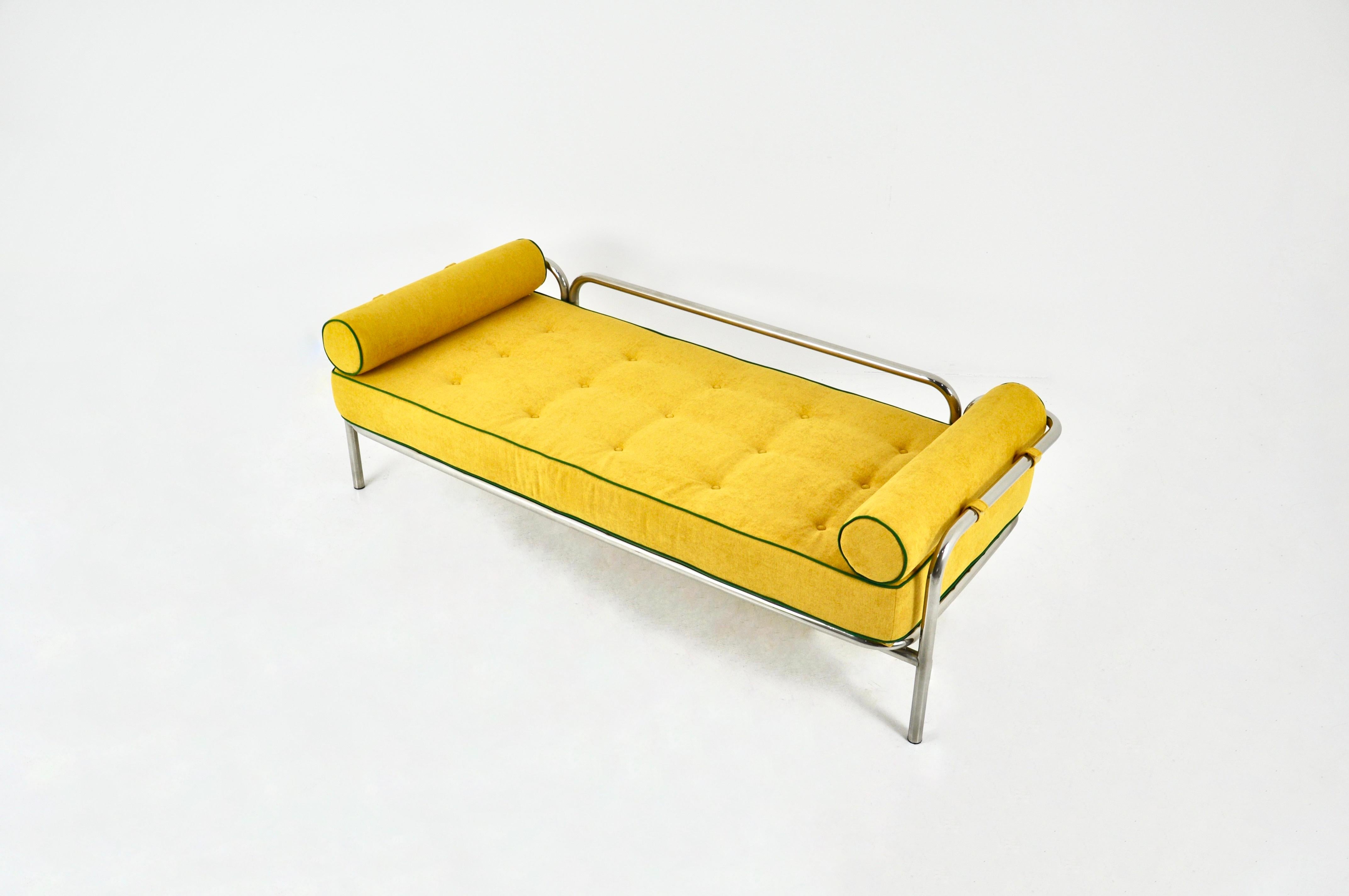 Daybed, meridian with cushion in yellow fabric with green stitching and metal structure by Gae Aulenti. Model: Locus Solus.  Wear due to time and age 
