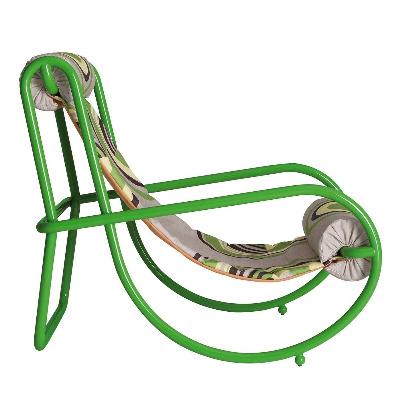 Reinterpreting her Sgarsul rocking chair in contemporary style, Gae Aulenti created the Locus Solus Armchair, whose tubular steel frame and bright finish will make a statement in any outdoor setting. Captivating and bold, the vivid green is matched