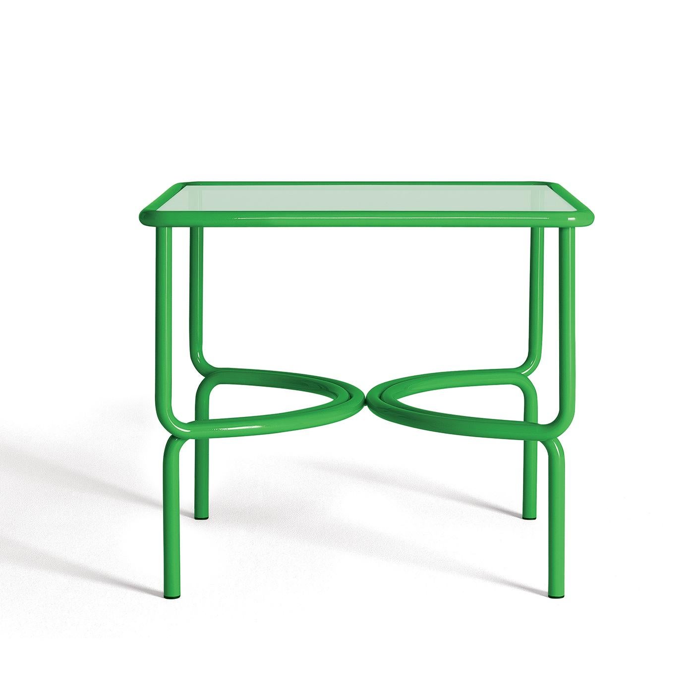 A colorful and linear silhouette defines all the pieces from the iconic Locus Solus Collection, designed in 1964 by Gae Aulenti and introduced again by Exteta in 2016. The square top in extra-light tempered glass is supported by a bright green