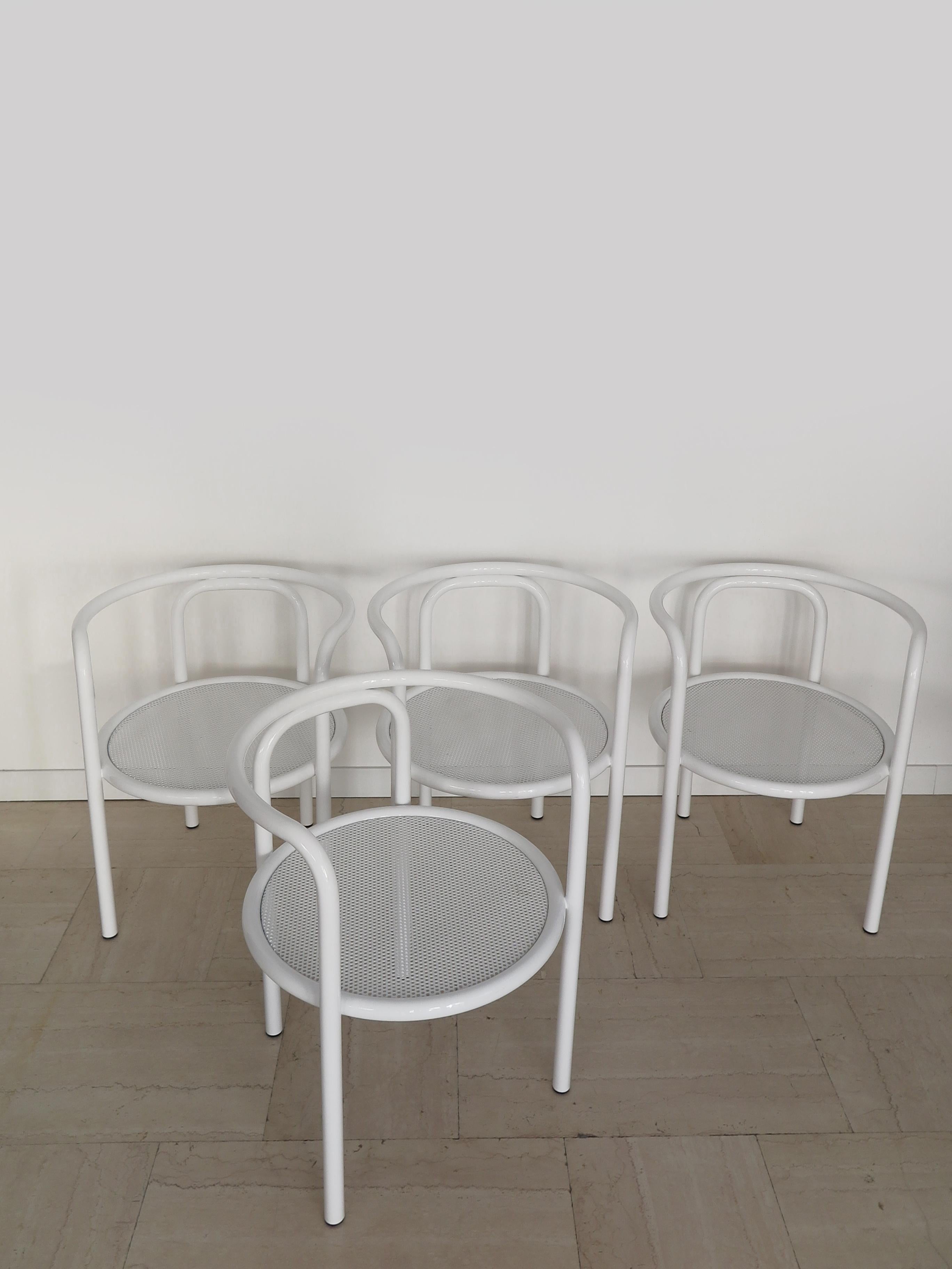 Set of four Italian midcentury modern design dining chairs or out door chairs model “Locus” designed by Gae Aulenti and produced by Poltronova from 1964 with painted tubular metal frame and perforated metal seat.

Characterised by clean, geometric