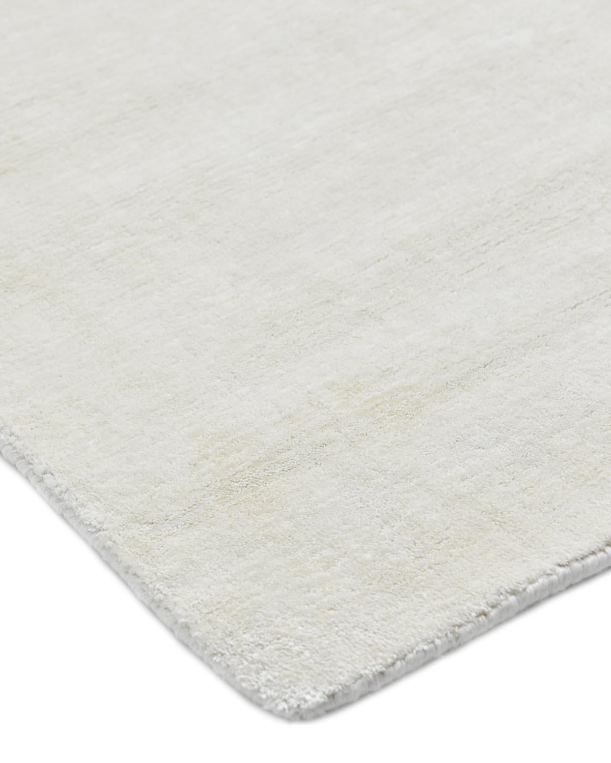 Color: Ivory. Made In: India. 60% Linen, 30% Viscose, 10% Cotton. Subtle tone-on-tone stripes give the Solid collection a depth and sophistication all its own. These rugs can pull the disparate elements of a room into a beautifully cohesive whole;