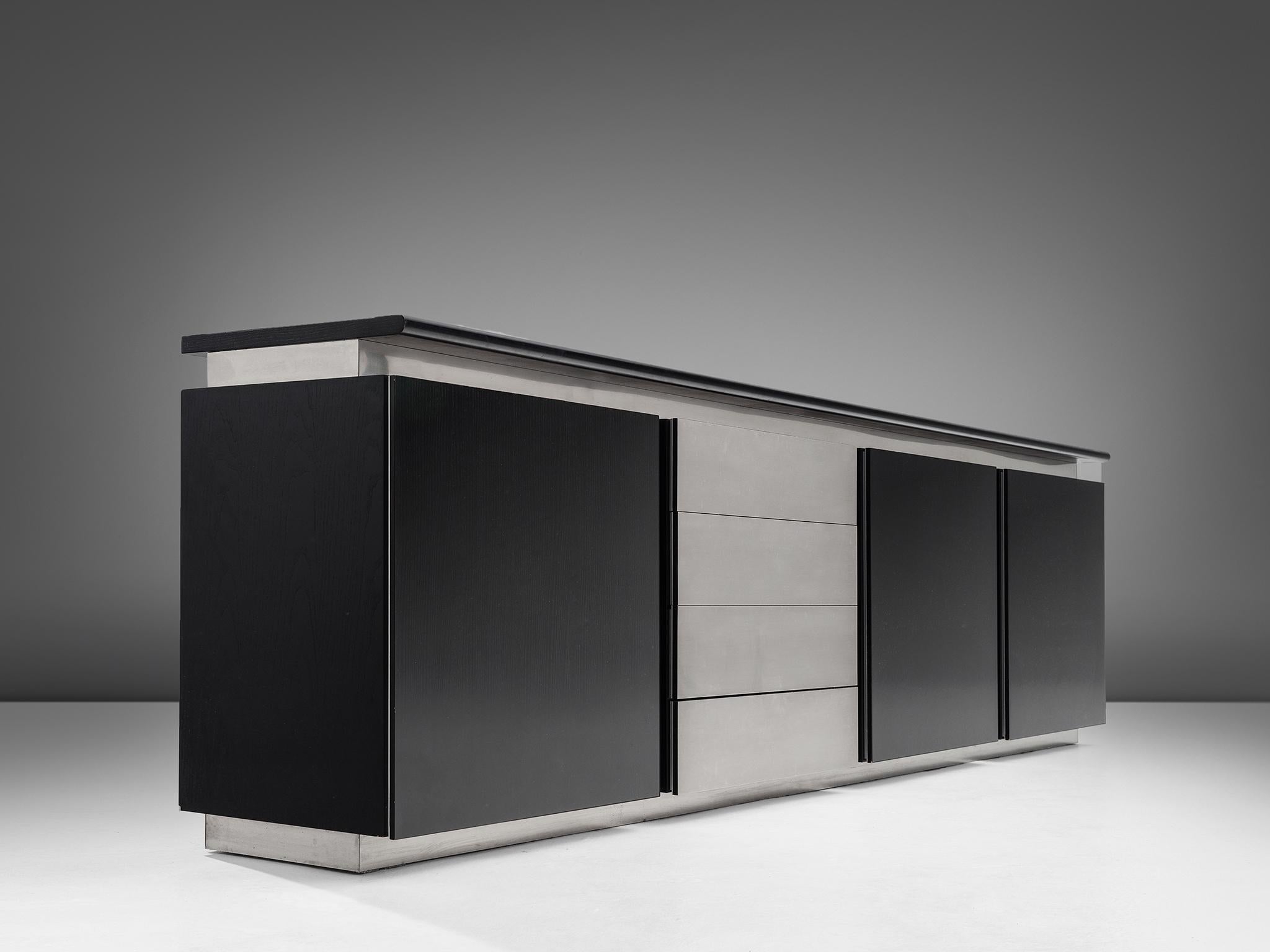 Lodovico Acerbis for Acerbis, sideboard, oak and steel, Italy, 1970s.

This elegant and modern credenza in stainless steel and stained oak is designed by Lodocivo Acerbis and part of the 'Parioli System'. Within this line of design Acerbis created