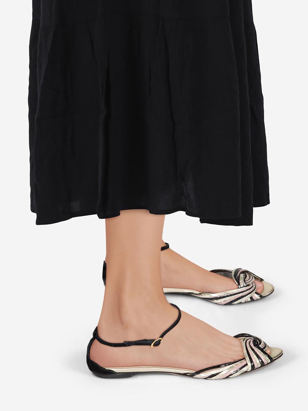 CONDITION is Very good. Minimal wear to sandals is evident. Minimal wear to the toe tips on both shoes where abrasions can be seen. There is cracking to the toe straps on both shoes on this used Loeffler Randall designer resale item. Comes with
