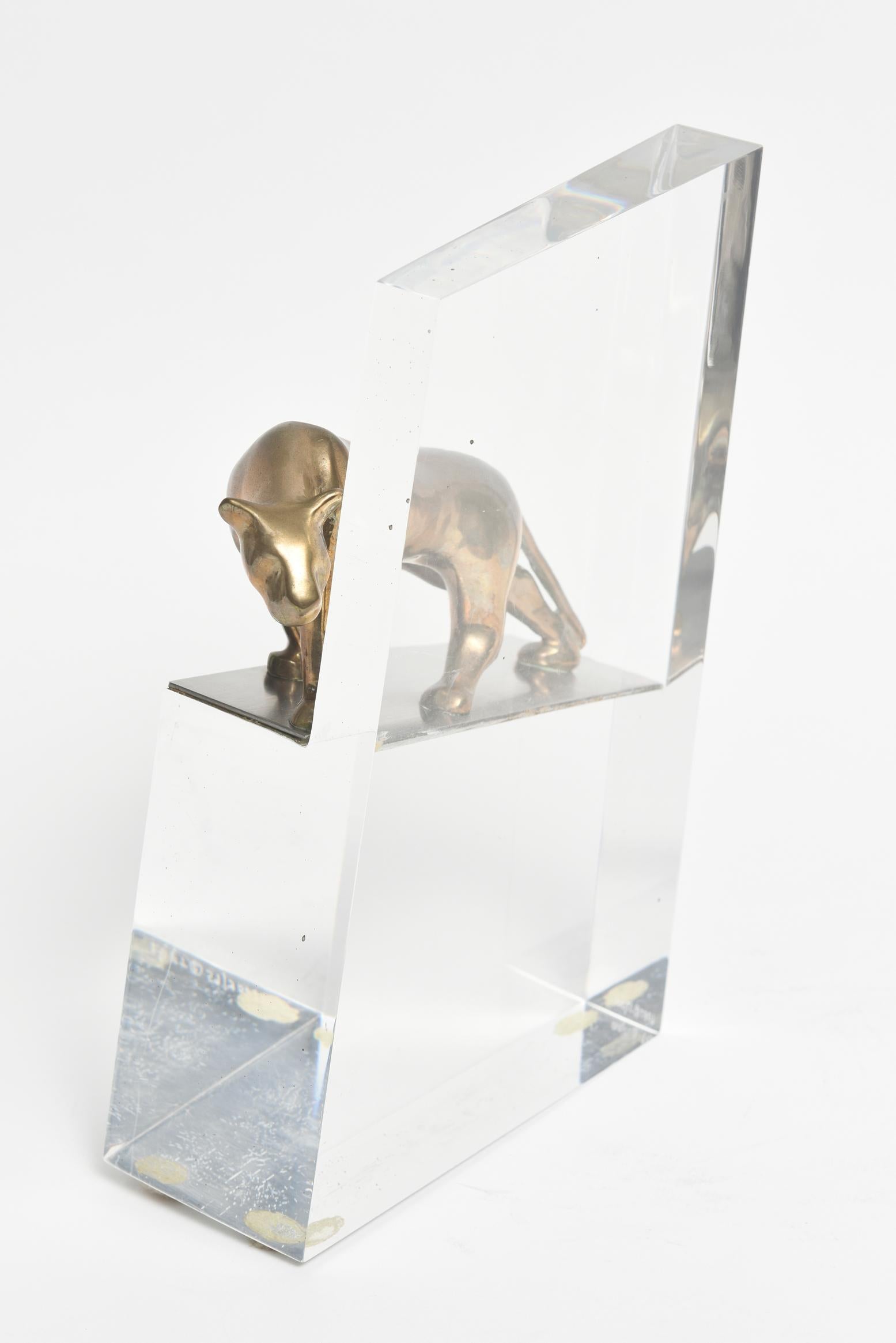 Striking bronze panther looking around the acrylic wall it is standing on. Designed by 20th century artist Vanderveen, Loet (Dutch, 1921-2015). 
Marked on bottom of acrylic 